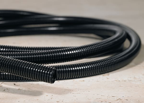 Hellermanntyton - Gaine annelée HG-ELW, Ø nominal 10, polyamide 6 (PA6), noir, rouleau de 50m