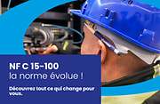 électricien avec un crayon Sonepar derrière l'oreille, mise en avant NF C 15-100