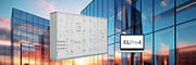 Tableau électrique XL"hP et en arrière plan des bâtiments
